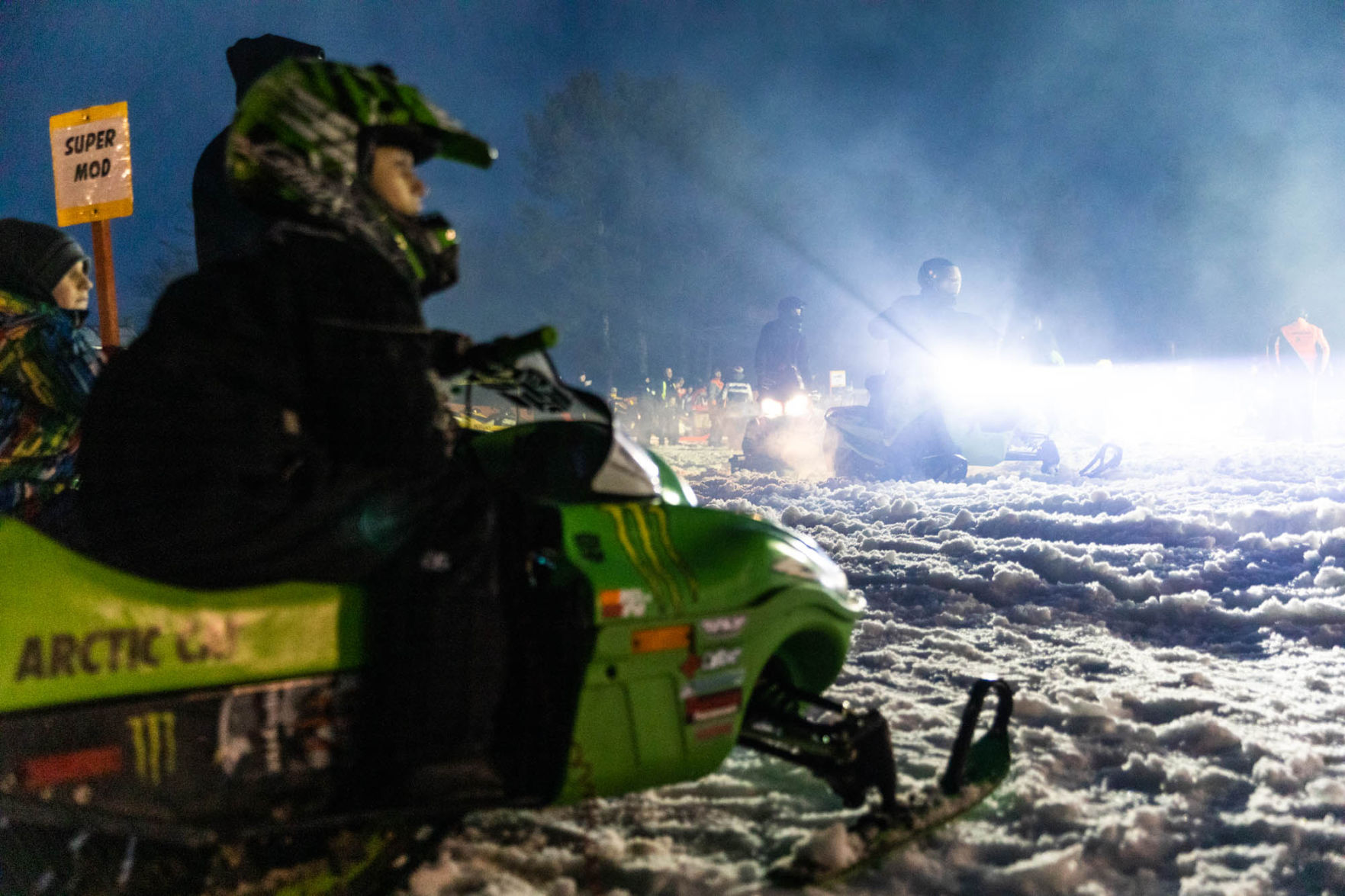 Snowmobile races heat up the night